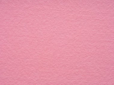 Texture of soft pink felt material close-up. Handicraft concept, crafts, DIY, do it yourself. Top view, flat lay, layout, place for text. For shops with goods for creativity patchwork or art work