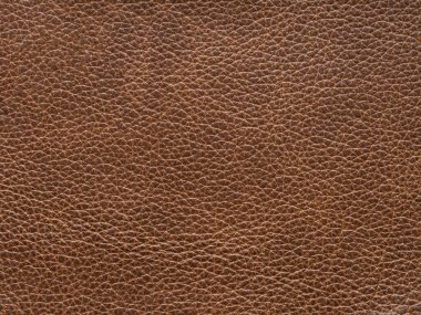 Beige or light brown color leather skin natural with design lines pattern or abstract background. Can use as wallpaper or backdrop luxury event. Genuine leather texture. Faux eco leather