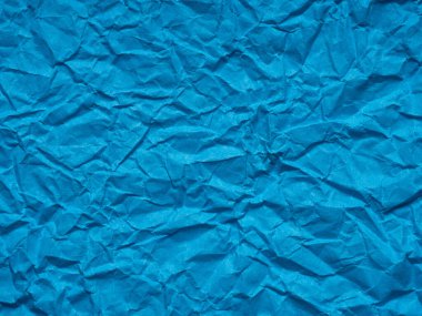 Dark matte blue crumpled paper texture. Blank page pattern for winter season Christmas festival card, new year designs decoration, background concepts, text, lettering, wall screen saver, 3d art work