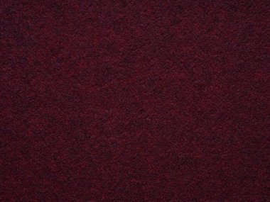 Dark red blank felt texture closeup. Full frame retro, vintage pattern. Top view, layout, place for text. Textured wool pattern for shops with goods, creativity to illustrate patchwork master classes