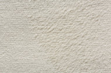 Ordinary soft textile background in white colour. High resolution photo.