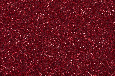 Yeni Noel tasarımınız için takdire şayan koyu kırmızı tonunuzda şık bir parıltı dokusu. Yüksek çözünürlüklü fotoğraf.