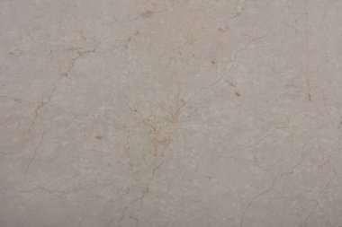 Natural Botticino Fiorito polished marble background in classic beige tone. clipart