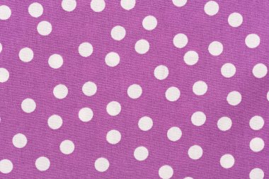 Nokta Desenin mor kumaş dokusu üzerinde kapat.