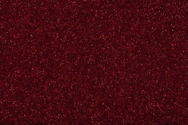 Zarif koyu kırmızı parıltı dokusu, şık tasarımınız için Noel duvar kağıdı. Yüksek çözünürlüklü fotoğraf.