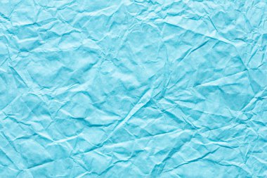 Yeni tebrik kartınızın bir parçası olarak zarif mavi renkte buruşmuş kağıt dokusu, yeni bayram arkaplanı.