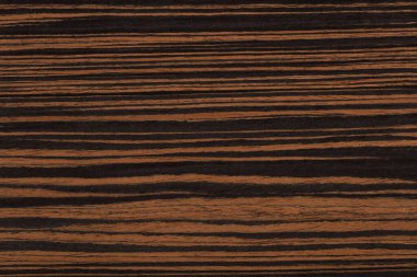 Zarif kahverengi renklerle doğal abanoz kaplama. Yüksek çözünürlüklü yüksek kaliteli doku..