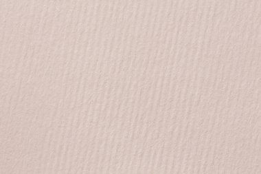 Bir ince dokulu dönen iş parçacığı doku ile bir sıcak tonlu, off-beyaz kağıt arka plan. Yüksek çözünürlüklü fotoğraf.