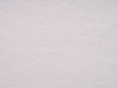 Keçenin yumuşak beyaz tuvali, yaratıcılık ve barışçıl düşünceler için boş bir yazı tahtası sunuyor.