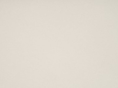 Kağıt yüzeyi, hayal gücü için boş bir sayfa sunan minimalist güzelliği, tekdüze dokusunu ve tonunu taşır.