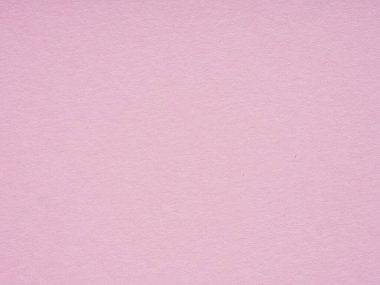 Kalıplaşmış pembe kağıt yüzeyi, sevgi ve kibarlık mesajları iletmek için mükemmel bir ortam ortamı olduğunu gösteriyor.