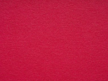 Kırmızı dalgalar dokulu bir kağıt parçasında yavaşça yuvarlanarak sıcaklık ve dokunsal bir merak hissi uyandırır.