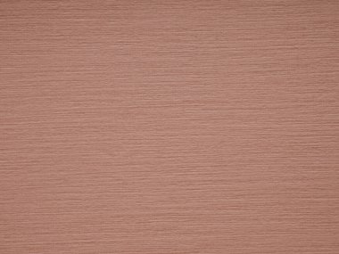 Terracotta renkleri dokuma kağıdının üzerini siler, sıcaklığı, dünyalılığı ve kırsal ama rafine edilmiş görsel çekiciliği iletir.