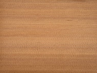 Bu fotoğraf, sıcaklığı ve doğal cazibeyi yansıtan klasik ahşap desenli kırmızı sedir kaplamasının ayırt edici dokusunu ve zengin rengini gösteriyor.