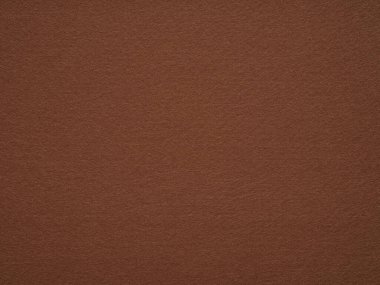 Bu resim, hem topraklama hem de cezbedici, doğal kucaklaşmayı ve evin rahatlığını anımsatan çikolata kahverengi keçeli kumaşı tasvir ediyor.