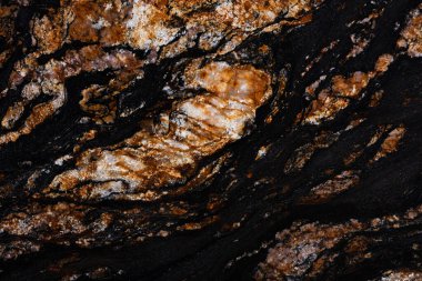 Çekici koyu renkli doğal Siyah Magma granit dokusu.