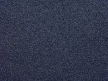 Bu resim, gecenin karanlığını ve gizemini çağrıştıran, yıldızlı bir gökyüzü gibi tanecikli, gece mavisi kağıt dokusunu tasvir ediyor.