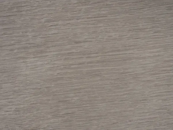 Bu resim gri lekeli meşe kaplamasının incelikli karmaşıklığını yakalar, yatay testere kesim dokusu çağdaş bir kenar ekler.