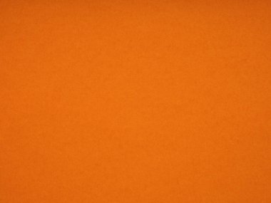 Dokulu turuncu arka plan canlı ve davetkar. Canlandıran ve canlandıran bir tuval dolusu sıcaklık sunuyor.