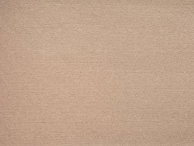 Sıcak bej kağıdın yüksek çözünürlüklü bir görüntüsü, ince liflerle nazik bir dokuyu temsil eden, yumuşak, dağınık bir ışıkta yıkanmış, sakin ve huzurlu bir hissi çağrıştıran