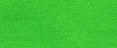 Yeşil keçeli arka plan, pürüzsüz doku. Bilardo ya da poker masasının yüzeyi. Yama ya da sanat eserleri için doğal bir his. Parlak renkli sanat ve kırtasiye malzemesinin tam çerçeve dokusu.