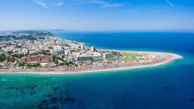 Aerial birds eye view drone photo of Elli beach on Rhodes city island, Dodecanese, Greece. Panorama with nice sand, lagoon and clear blue water. Famous tourist destination in South Europe clipart