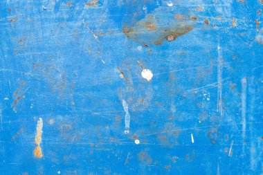 Soyut bir arkaplan olarak mavi rustik ve paslı desenli metali yakın plan