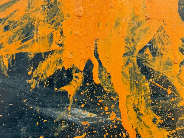 Orange paint abstract on metal surface texture