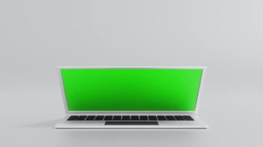 Yeşil ekranı göstermek ve yakınlaştırmak için laptop açık, uygulama web sitesi sunumu, 4K UHD biçimlendirmesi.