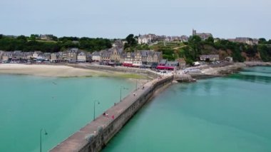 View of Cancale in Brittany, France, a city by the ocean. Drone view in 4k. Plage du Verger beach at Cancale, France. Famous place for oyster farms. 
