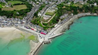 View of Cancale in Brittany, France, a city by the ocean. Drone view in 4k. Plage du Verger beach at Cancale, France. Famous place for oyster farms. 