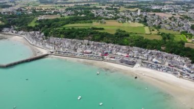 View of Cancale in Brittany, France, a city by the ocean. Drone view in 4k. Plage du Verger beach at Cancale, France. Famous place for oyster farms. 