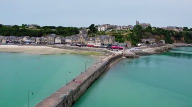 View of Cancale in Brittany, France, a city by the ocean. Drone view in 4k. Plage du Verger beach at Cancale, France. Famous place for oyster farms. 