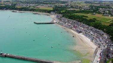 View of Cancale in Brittany, France, a city by the ocean. Drone view in 4k. Plage du Verger beach at Cancale, France. Famous place for oyster farms. 