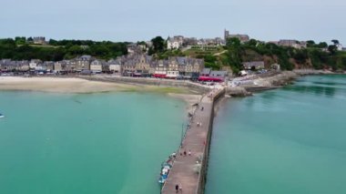 View of Cancale in Brittany, France, a city by the ocean. Drone view in 4k. Plage du Verger beach at Cancale, France. Famous place for oyster farms. 