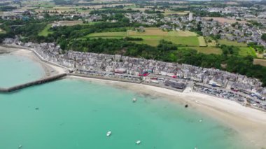 View of Cancale in Brittany, France, a city by the ocean. Drone view in 4k. Plage du Verger beach at Cancale, France. Famous place for oyster farms. 