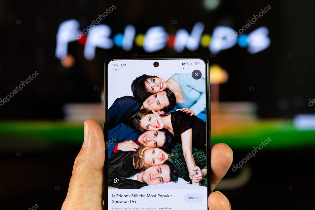 Belgrade, Serbia - OCTOBER 30, 2023: Reading about Friends TV show cast and the popularity of the show. Friends TV series is popular comedy sitcom created by David Crane and Marta Kauffman