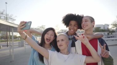 Happy centennial people taking smiling selfie. Group of students together at campus university . High quality photo