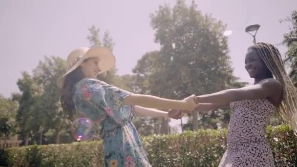 Multiracial Couple Friends Twirling Smiling Holding Hands Happily Outdoor Soap — Stock Video