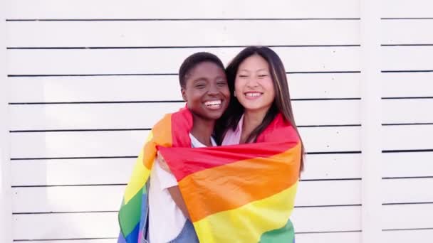 Multiracial Beautiful Lesbian Couple Love Looking Camera Embrace Affectionate Rainbow — Stock Video
