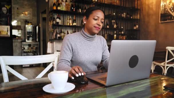 Beautiful African Woman Sitting Drinking Coffee Using Laptop Blogger Working — Stock Video