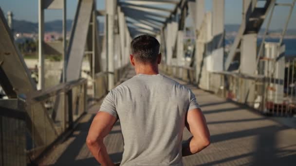 Follow Back Unrecognizable Mature Strong Man Running Alone Modern Urban — Stock Video