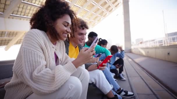 Crowd Happy Young People Sitting Quietly Stairs Smiling Using Mobile — Stock Video