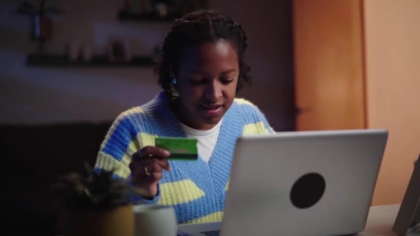 Young Black American Woman Using Credit Card Laptop Sitting Desk — Stock Video