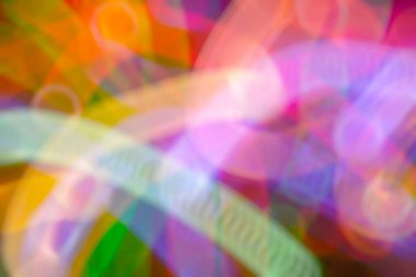 Christmas blurred background with glowing colorful garlands