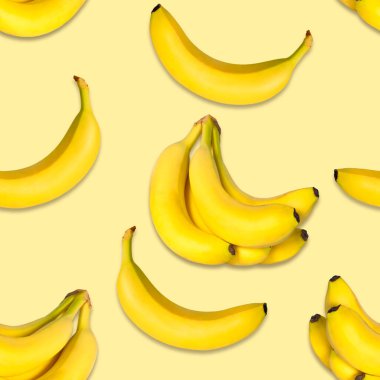 Sarı arka planda kusursuz muz deseni. Doğal muz.