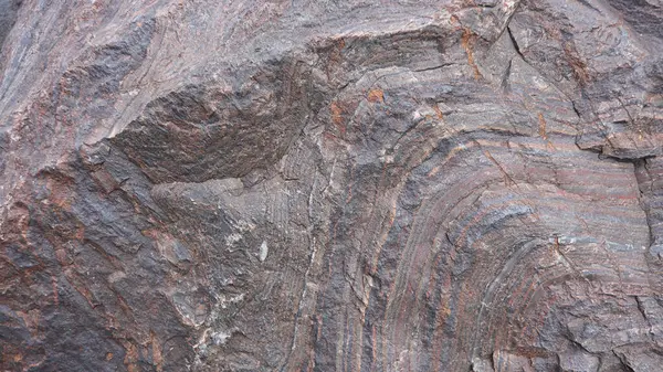 Jeolojik doğal şablonlarda bir taş yüzeyin arka planı.