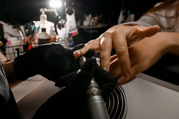 Female Manicurist Hands Sterile Black Gloves Removing Cuticle Woman Hand — Stock Photo, Image