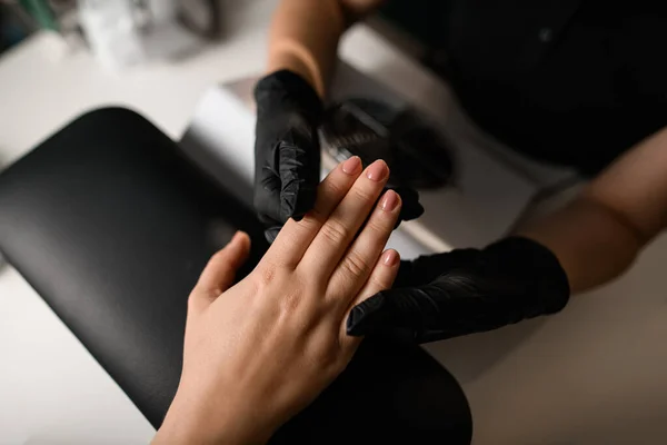 Manicure Procedure Beauty Salon Master Black Gloves Hands Client Personal — Stock Photo, Image