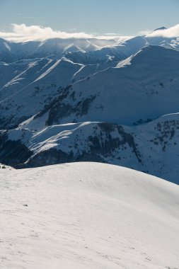 Incredible view of winter mountain ranges covered with white snow. Nature mountain background. Pristine nature